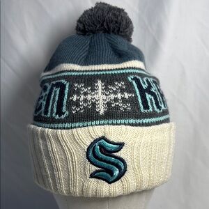 Seattle Kraken NHL blue and cream kids’ knit hat by American Needle. Acrylic.